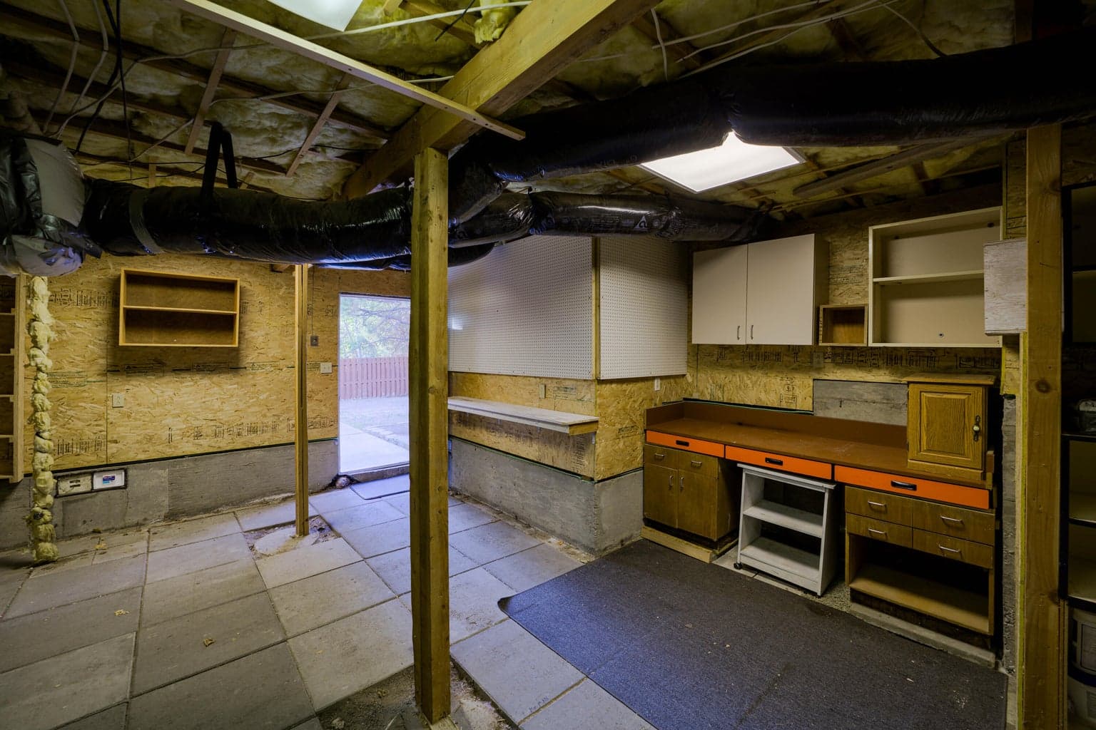 Work & inside storage area behind garage