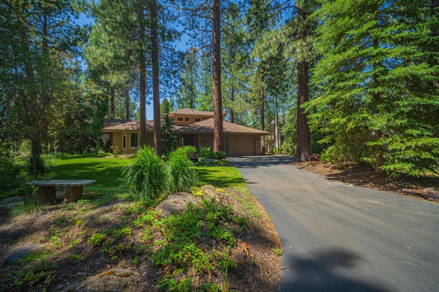 Long, paved driveway provides good set back from the lane.