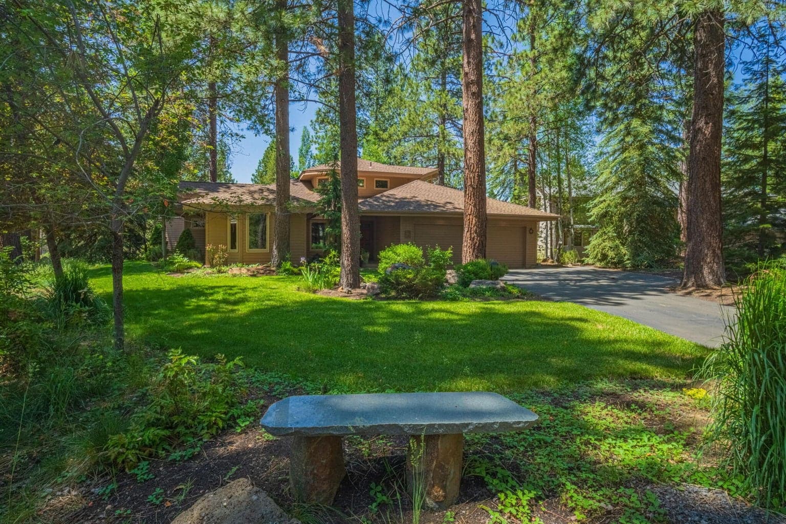 Enjoy manicured grounds, water feature and lush, green grass.