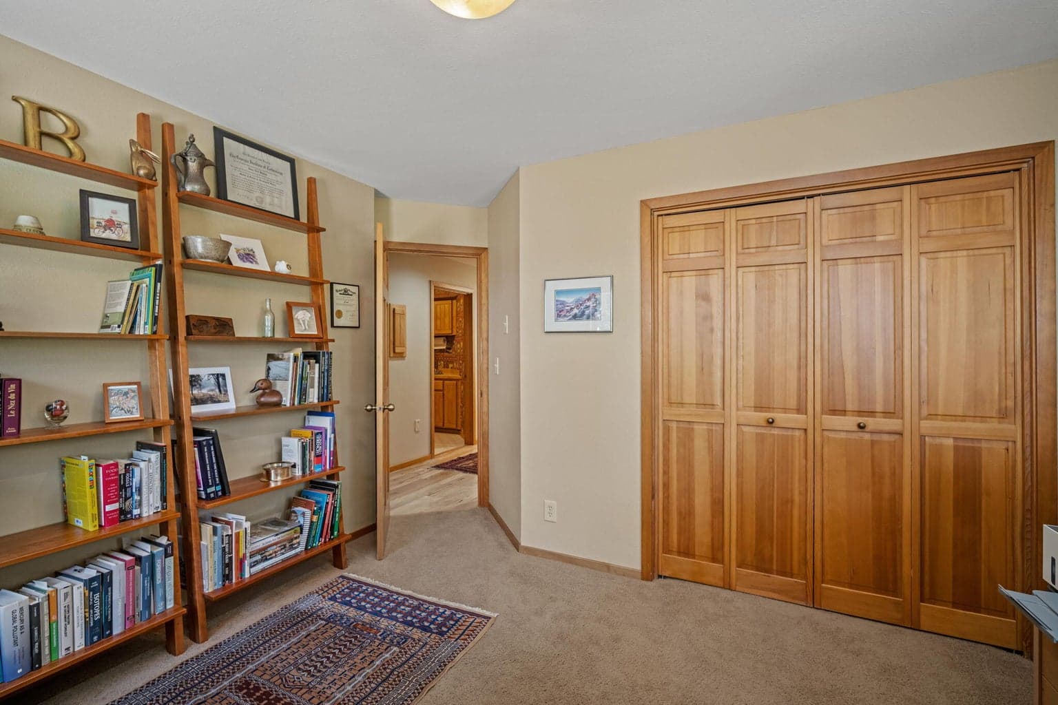 One of the 3 bedrooms on the main. Closet has custom shelving built-in.