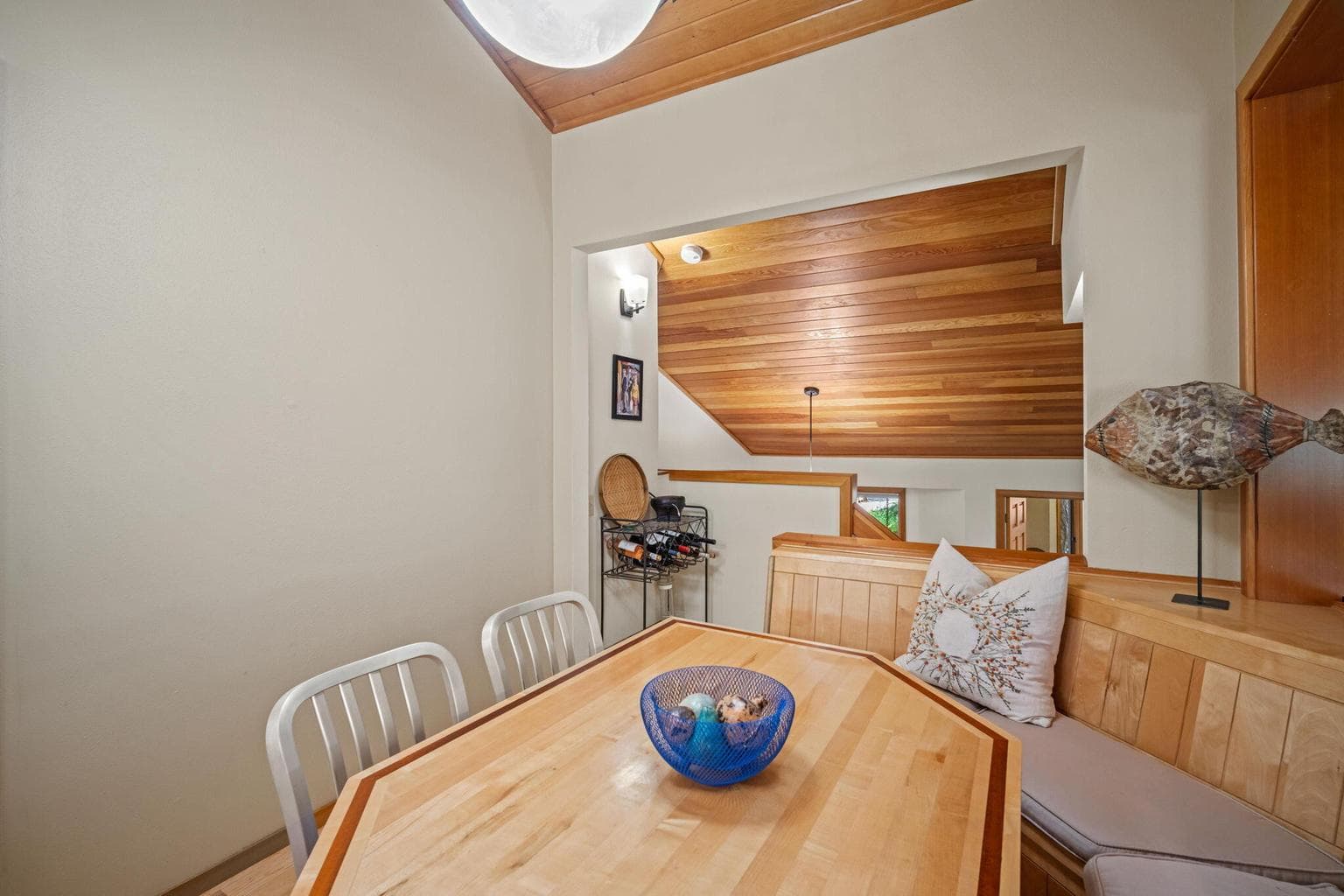 View of the banquette, a cozy gathering hub for all.