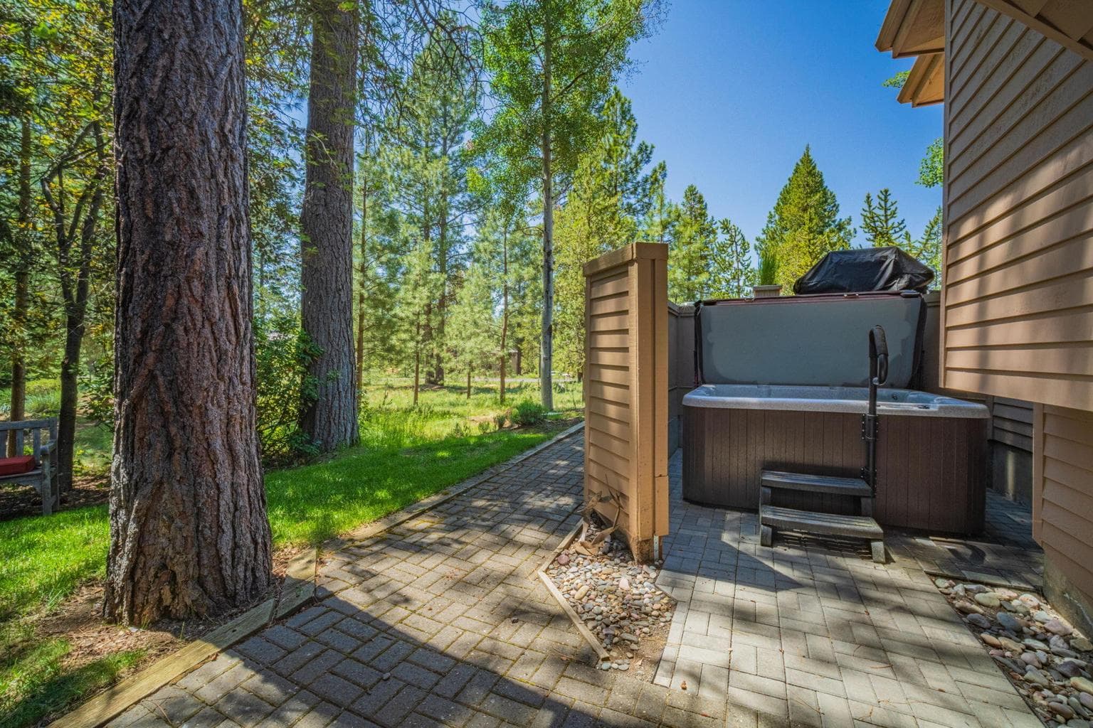 Paver patio with hot tub for year round soaking and star gazing.
