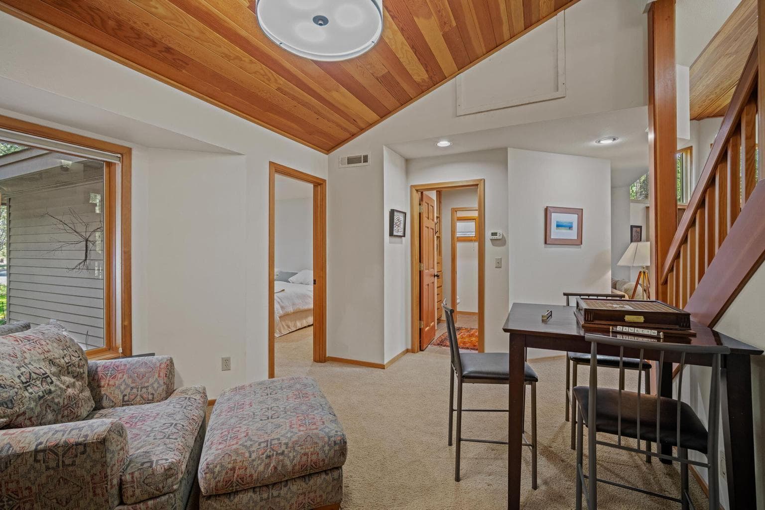 Walk into this creative space, right off the entry way. Large bedroom and a full bath off to the left.