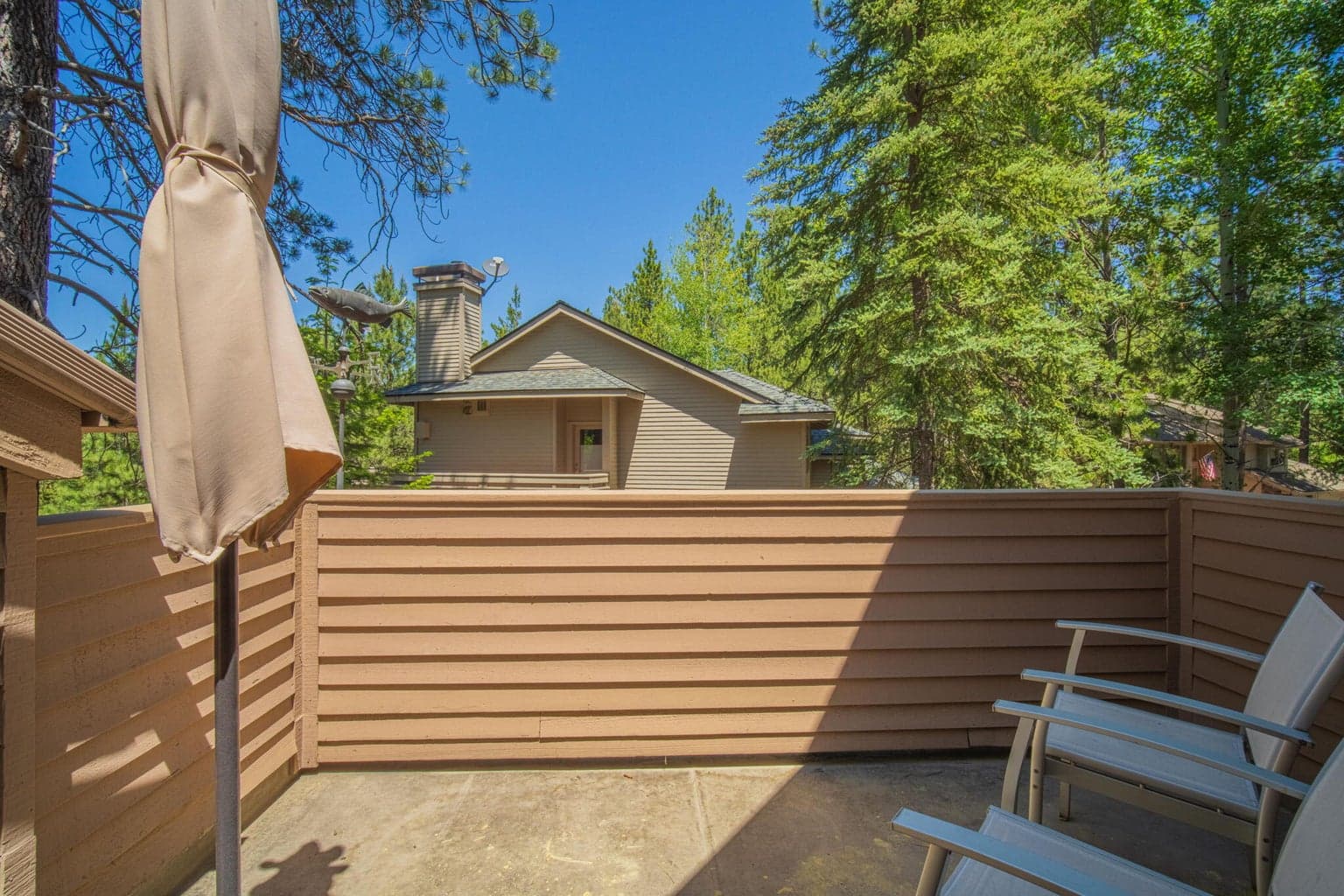 Private, encased decking, located off of primary suite.