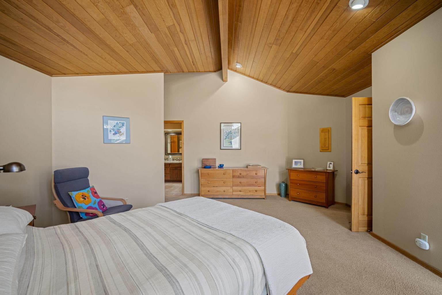Primary suite is spacious and relaxing.