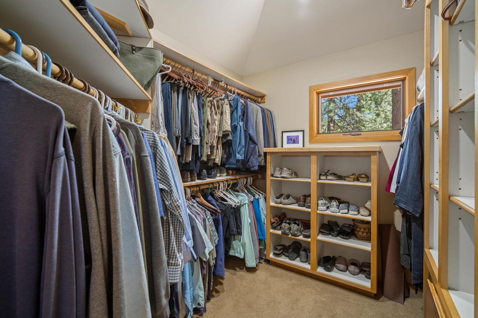 Walk-in closet in the primary suite.