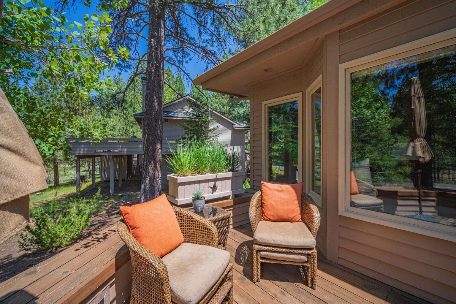 North end of the back deck, custom decking with built in seating along the edges and plenty of room for outdoor furniture to enhance your outdoor hobbies of bird watching and star gazing.