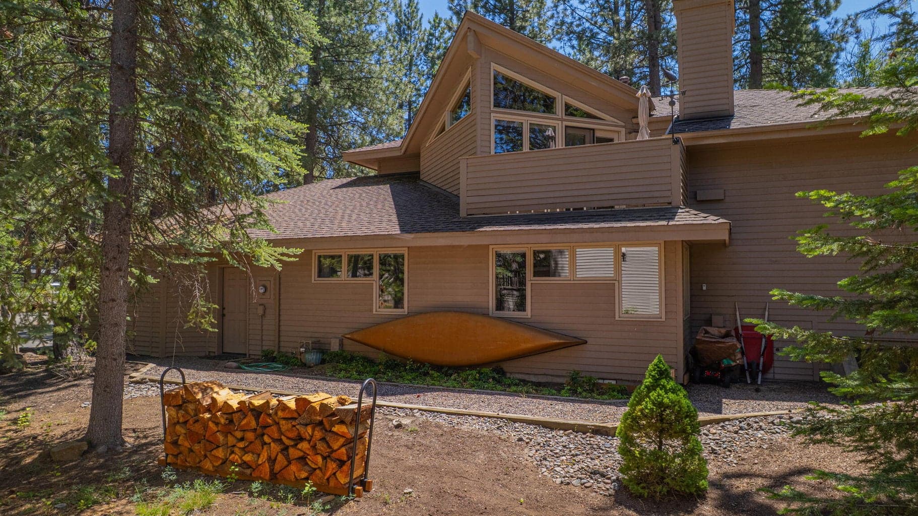 View along the side of the home (north). Paver walkway surrounds