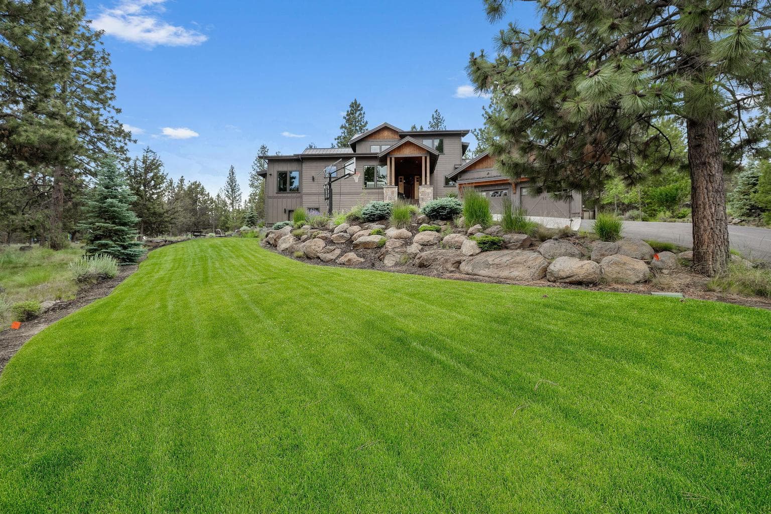 An elevated lot with classic Northwest curb appeal. Minutes to all Westside schools, amenities, River Trail and Downtown Bend.