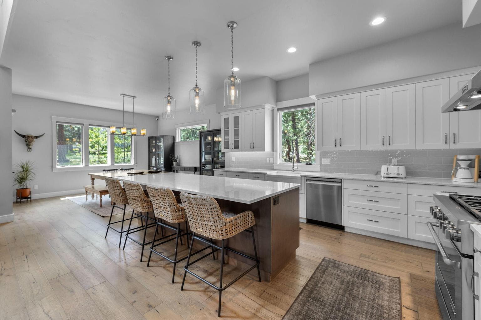 Fabulous Chef's Kitchen with stunning Quartz countertops and island for additional informal dining.