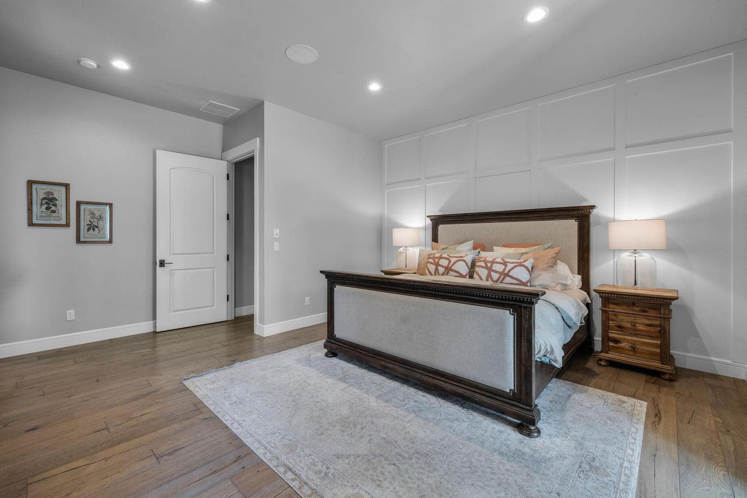 Privately located on the main level with an adjacent home office.