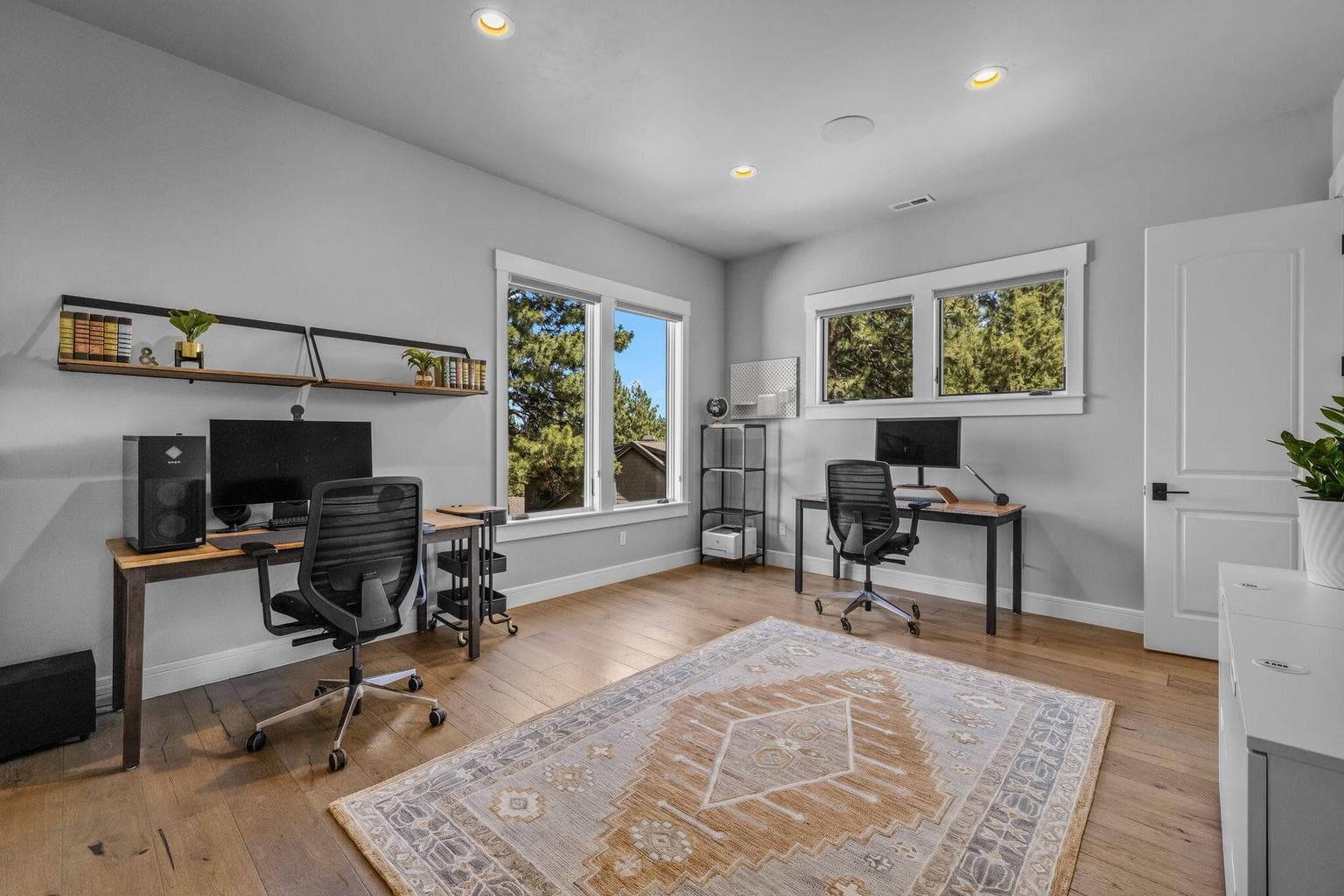 Two entries to this incredible office: one off the foyer hallway and the second off the Primary Suite. Private with tons of space.