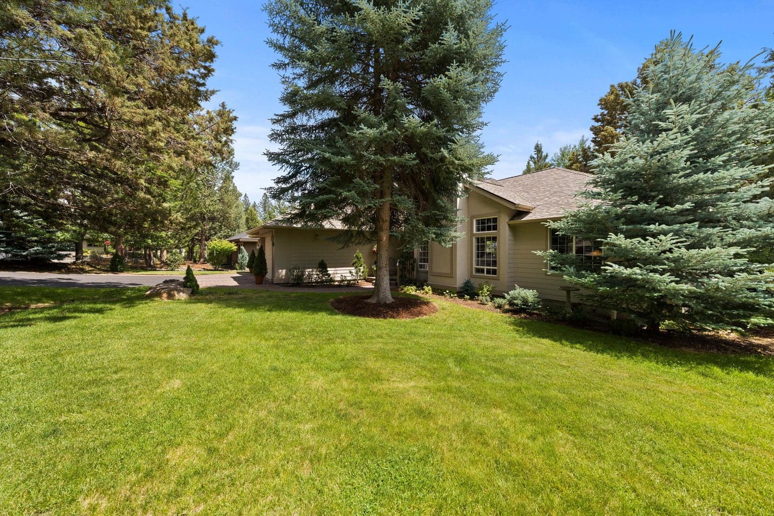Set back from the street this home offers privacy and tranquility.
