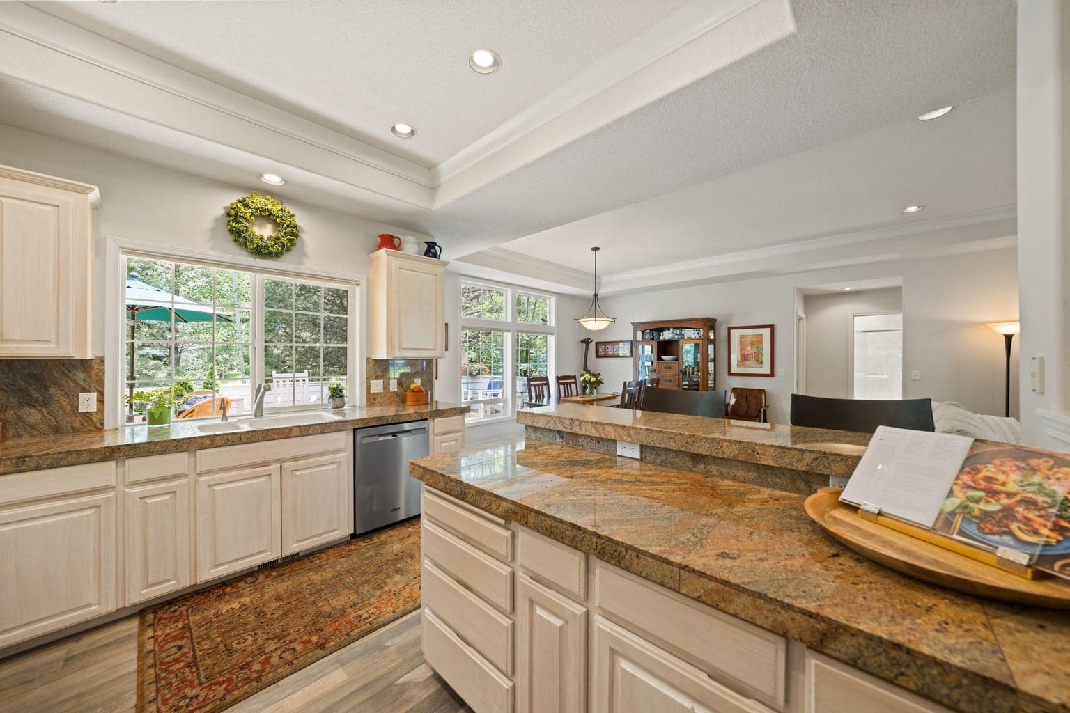 The spacious kitchen has plenty of counter space and looks out over the back yard.