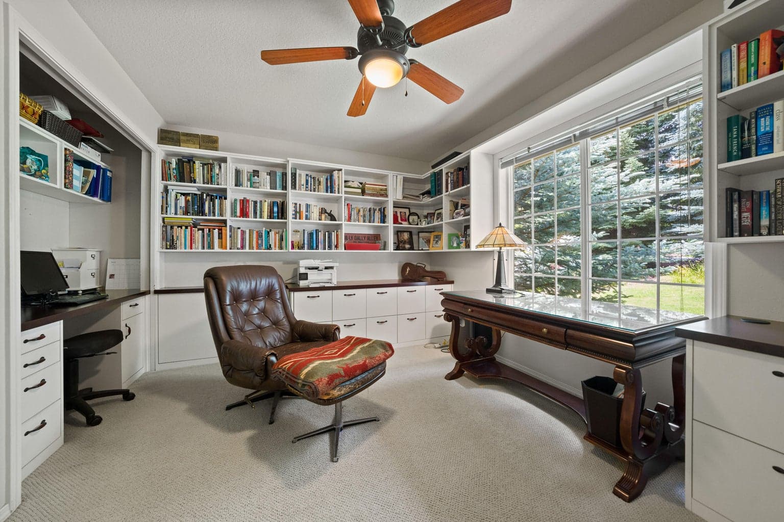 The office has beautiful built-ins but could be converted back to a bedroom if one desired.