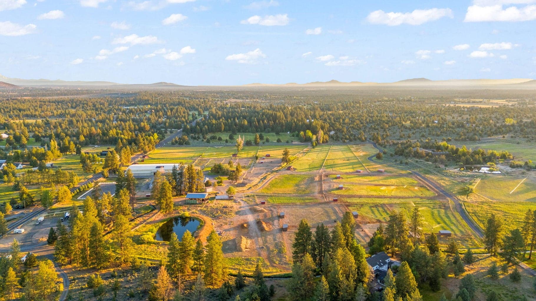 33 acres irrigated live-out pastures. Two of the largest indoor barn/arena facilities in the area