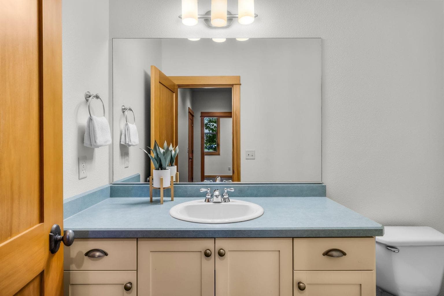 Powder bath main level. Tile floors.