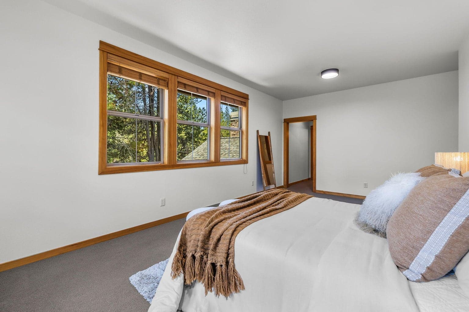 upper level Primary suite - lots of windows.