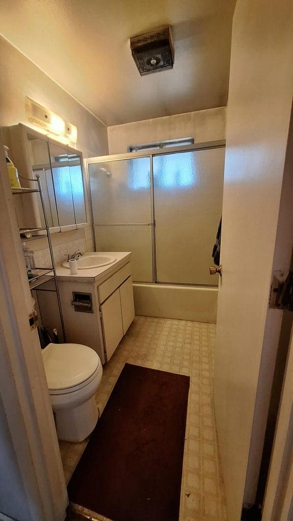 Bathroom, non updated unit