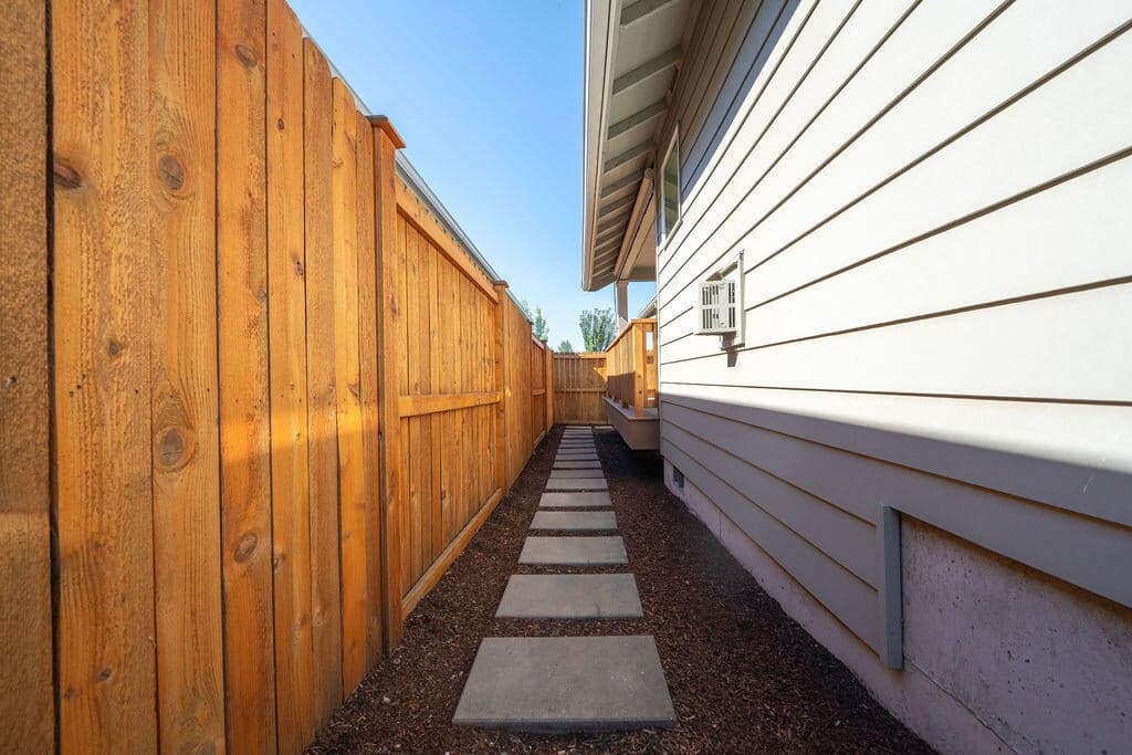 Walk way on side of home to back yard