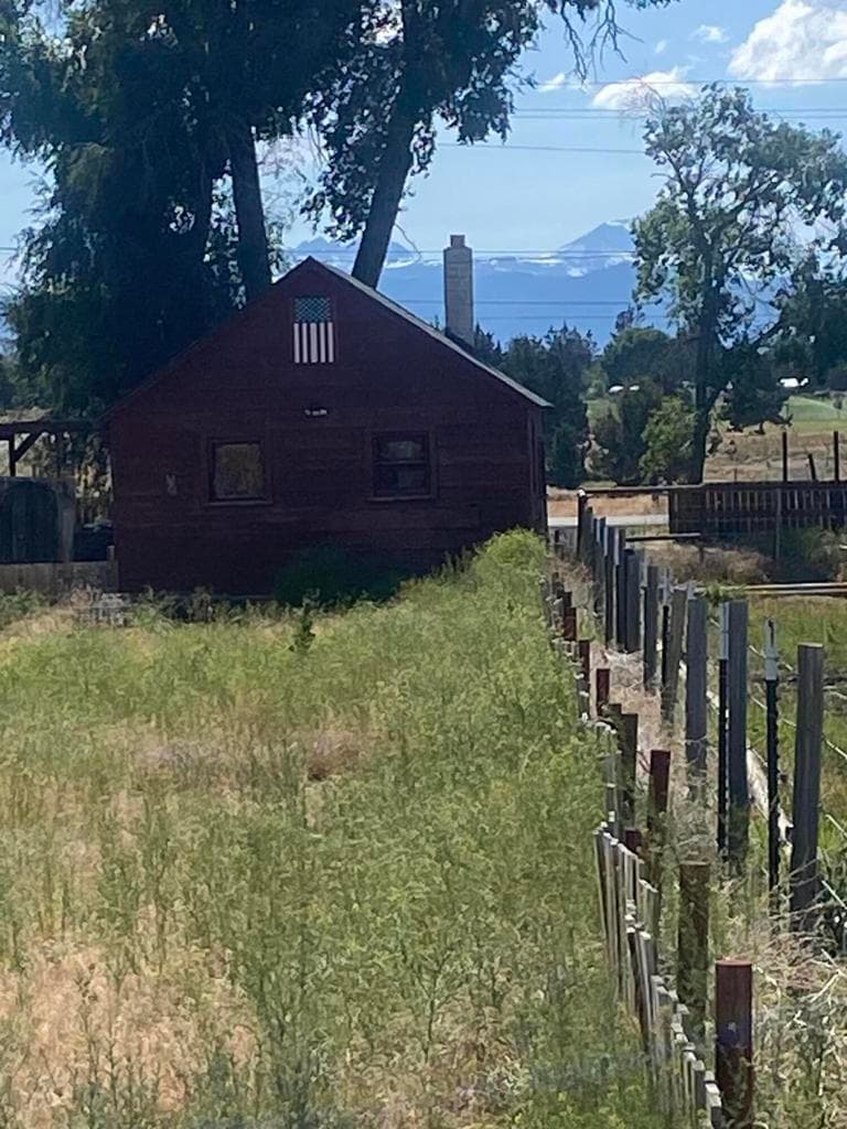 Fence line with large farmland