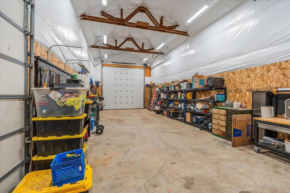 Insulated and includes a pellet stove.