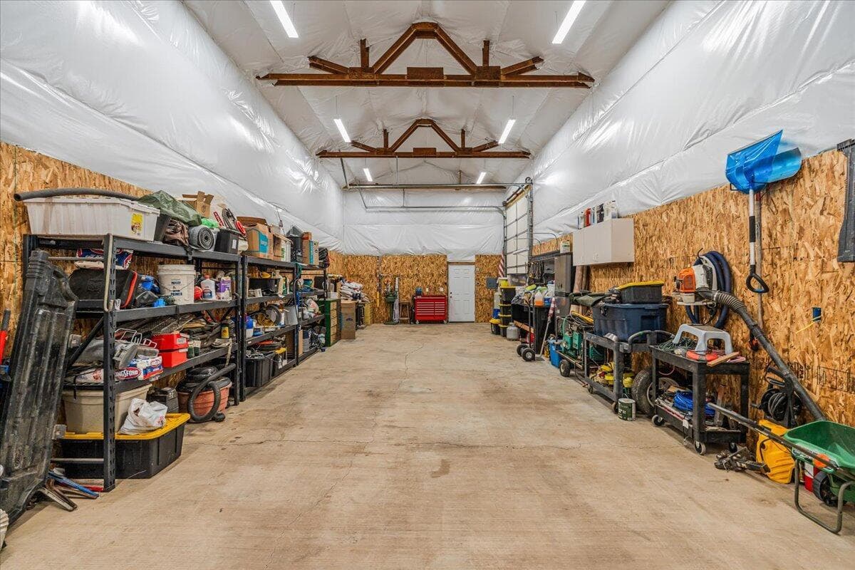 Scissor trusses and concrete floor.
