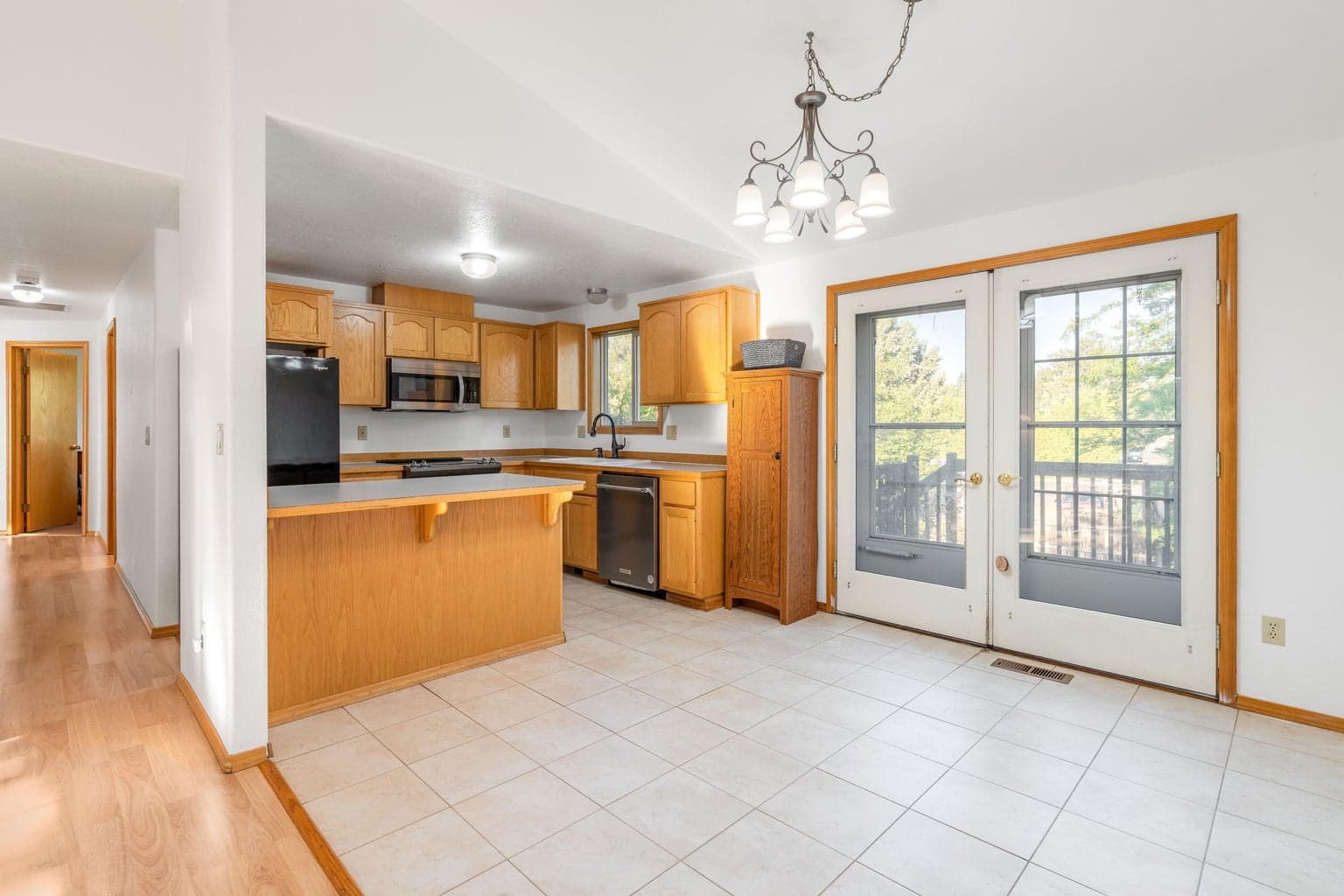 Doors from dining area open to back deck - take in the sunset!