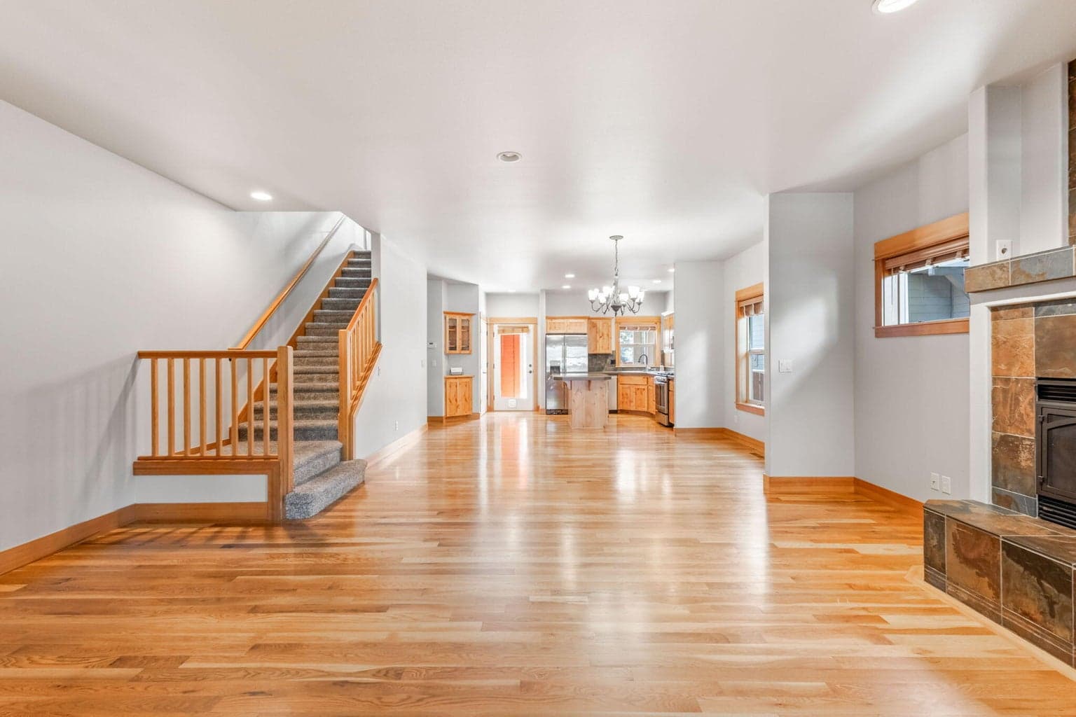 Open great room style living with comfortable flow from living and dining areas into the kitchen.
