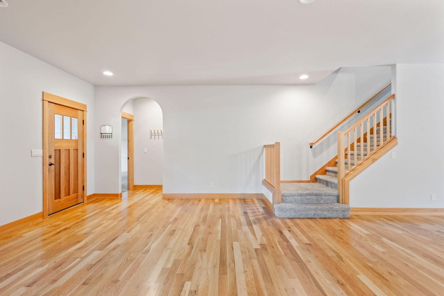 The main level primary is to the left as you enter the home