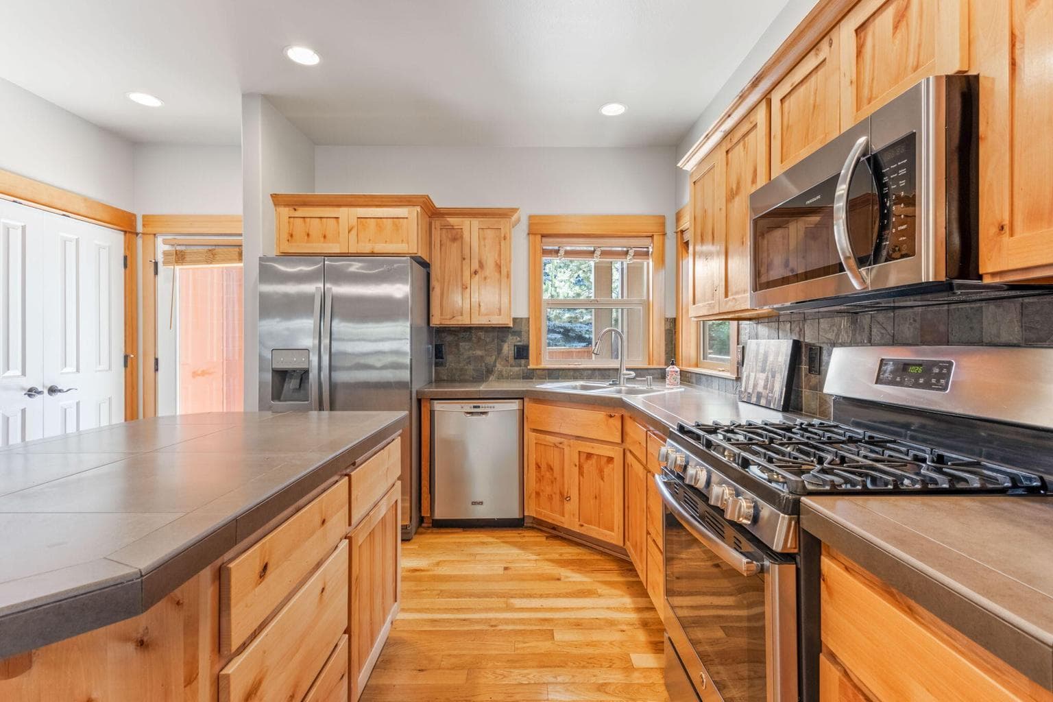 Kitchen boasts large island space with room for seating.