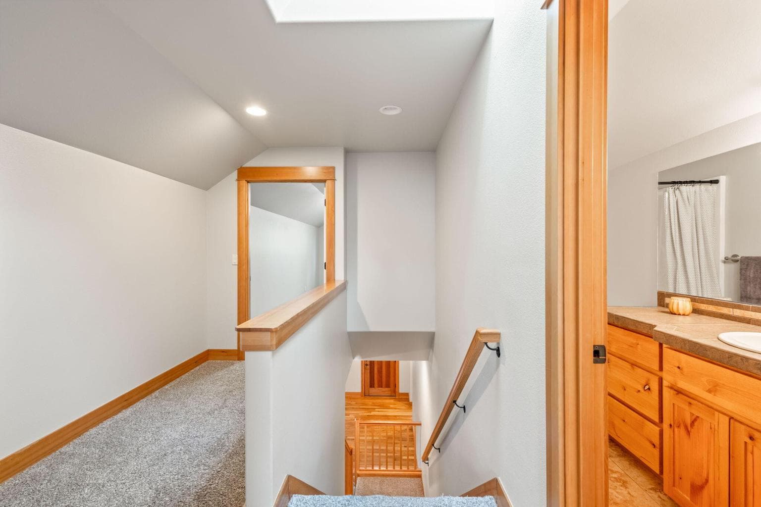 Upstairs is a 4th bedroom/bonus room and an office.