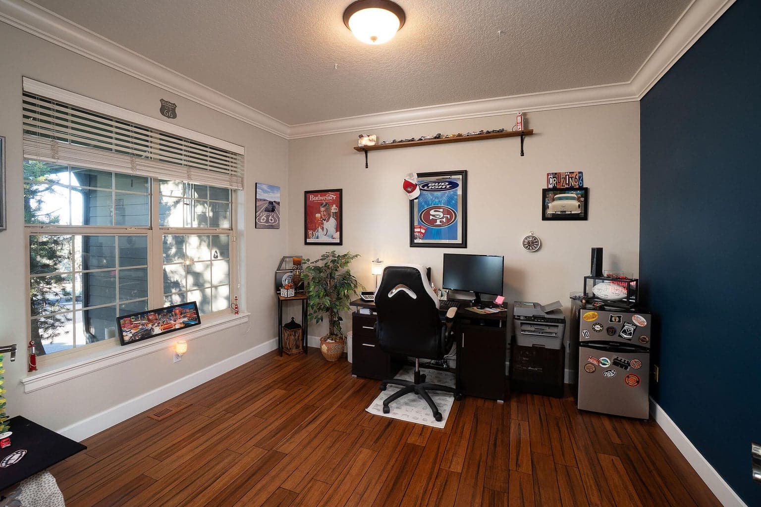 Office/den off the main entry features French doors.
