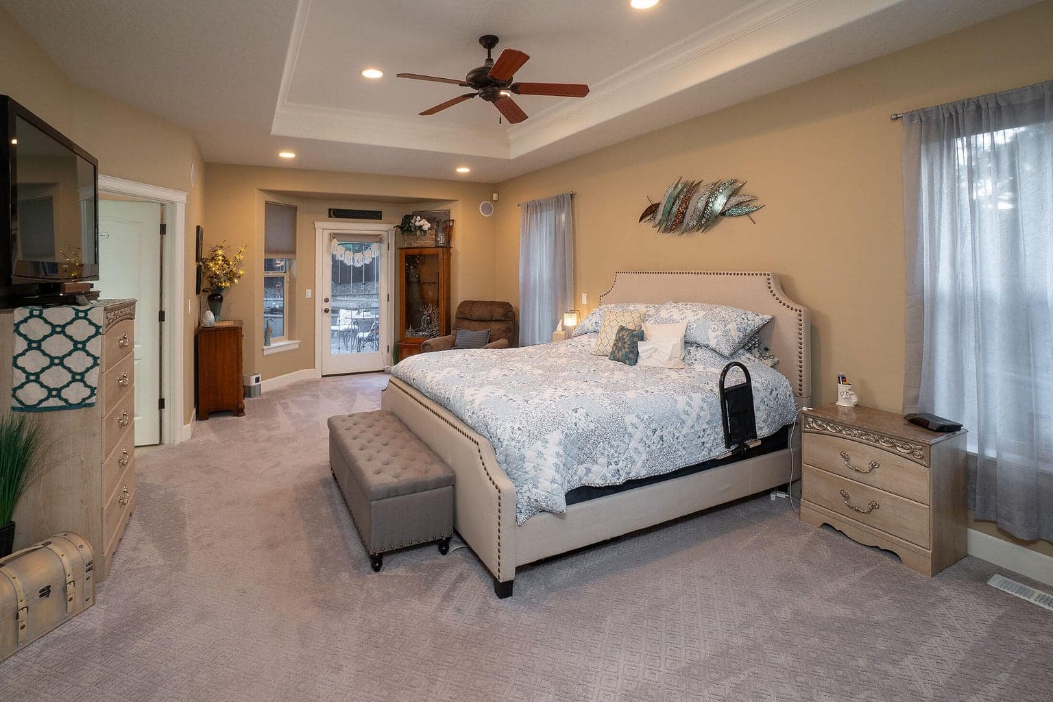Very roomy primary suite with patio access.
