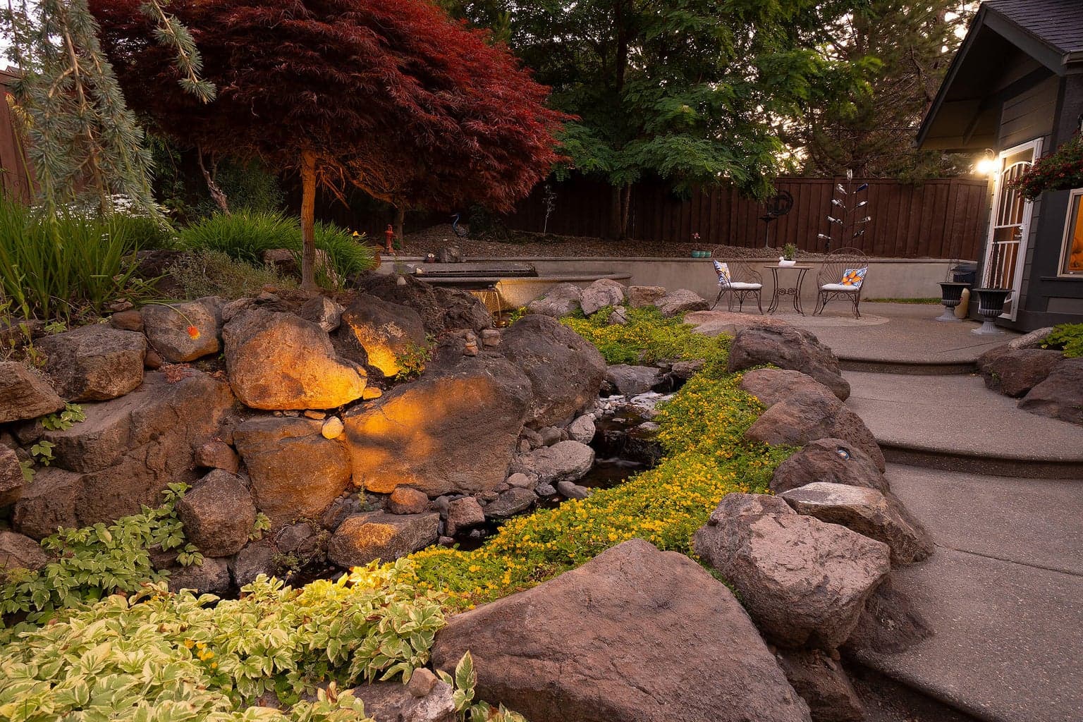 Beautiful night lit landscaping.