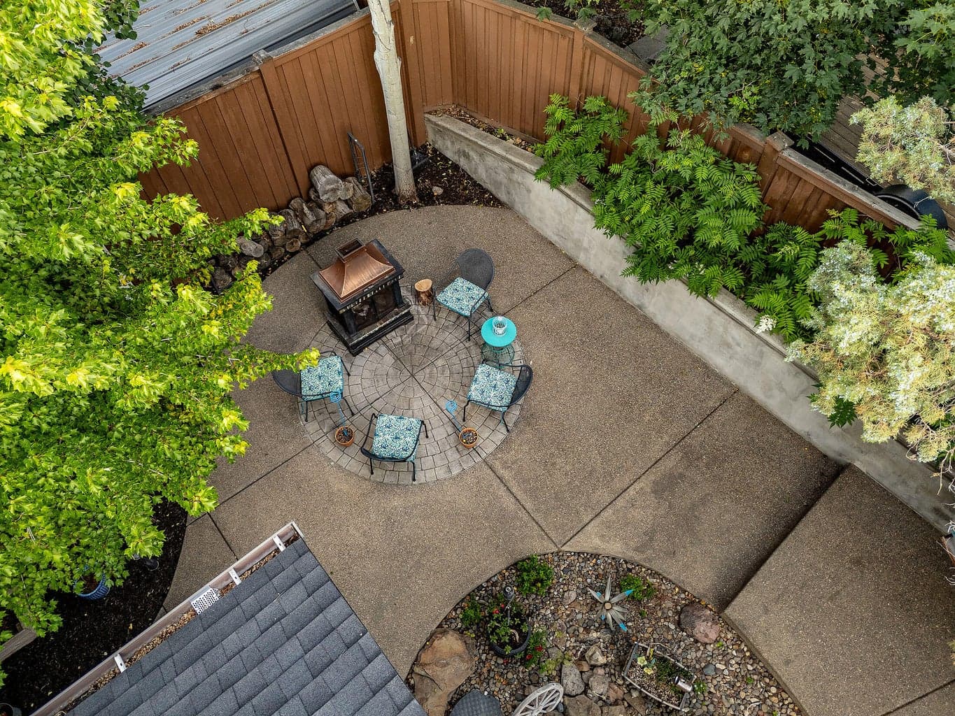 Extensive use of concrete throughout the back yard patio area.