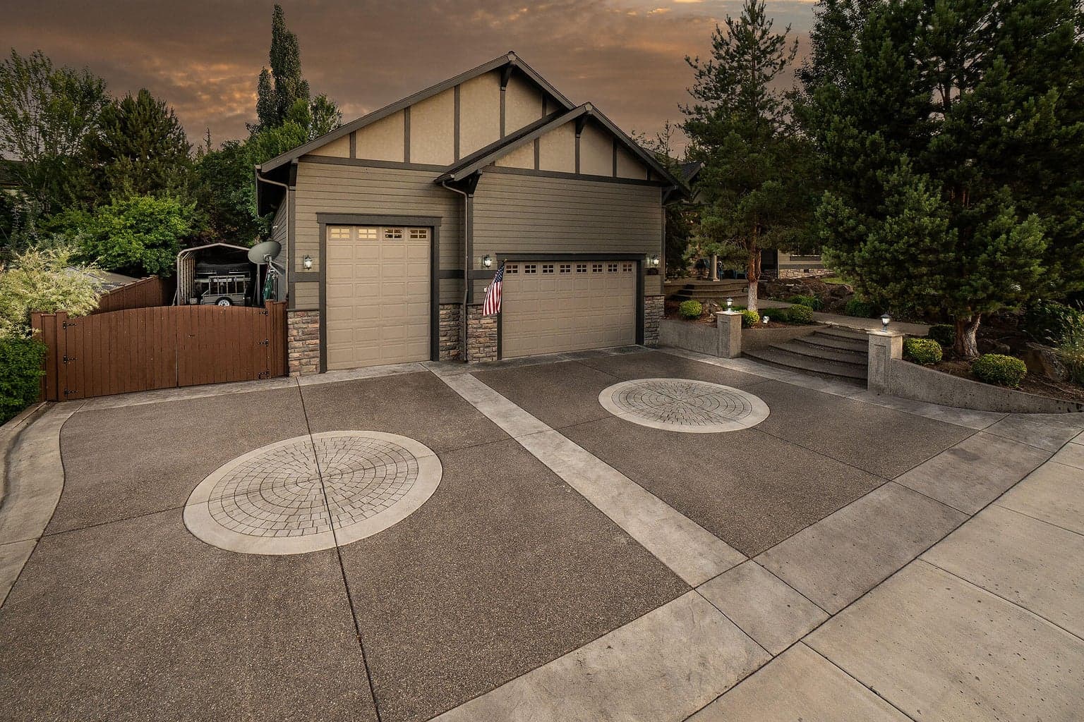 Exquisite custom designed paver driveway with plenty of guest parking.