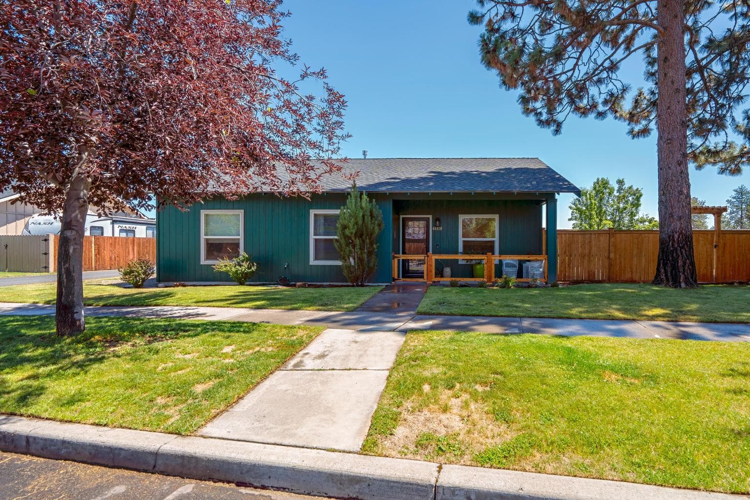 Front with fenced in patio
