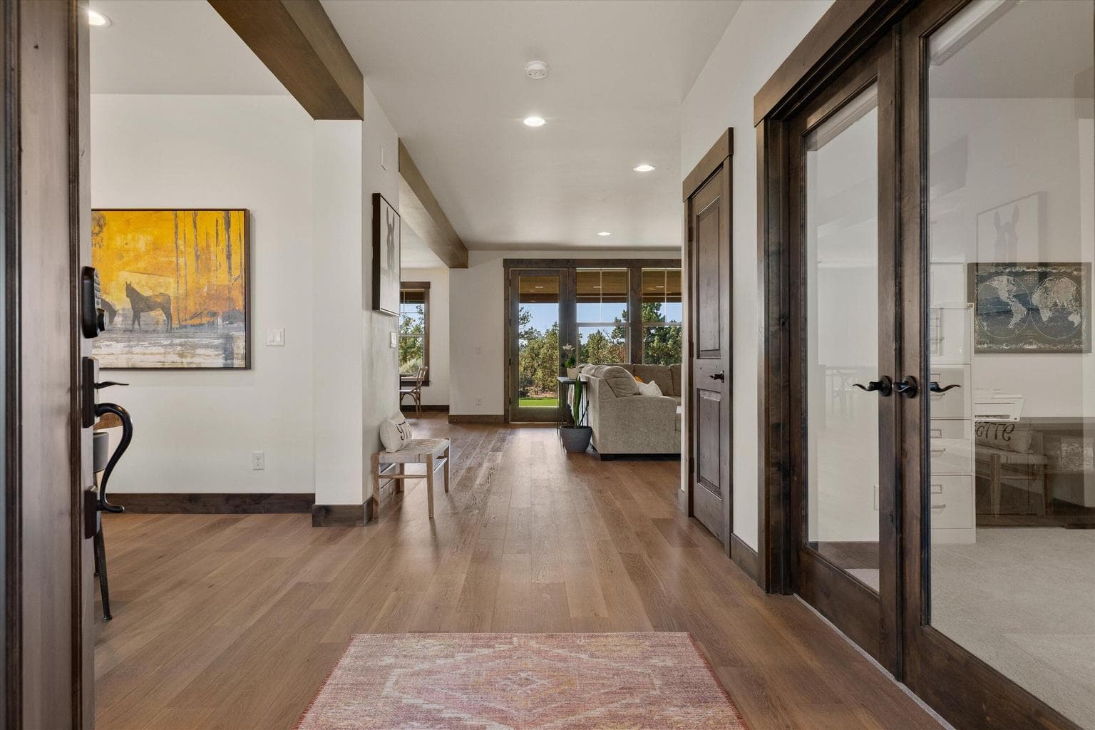 Foyer leading to dining room on the left, office on the right