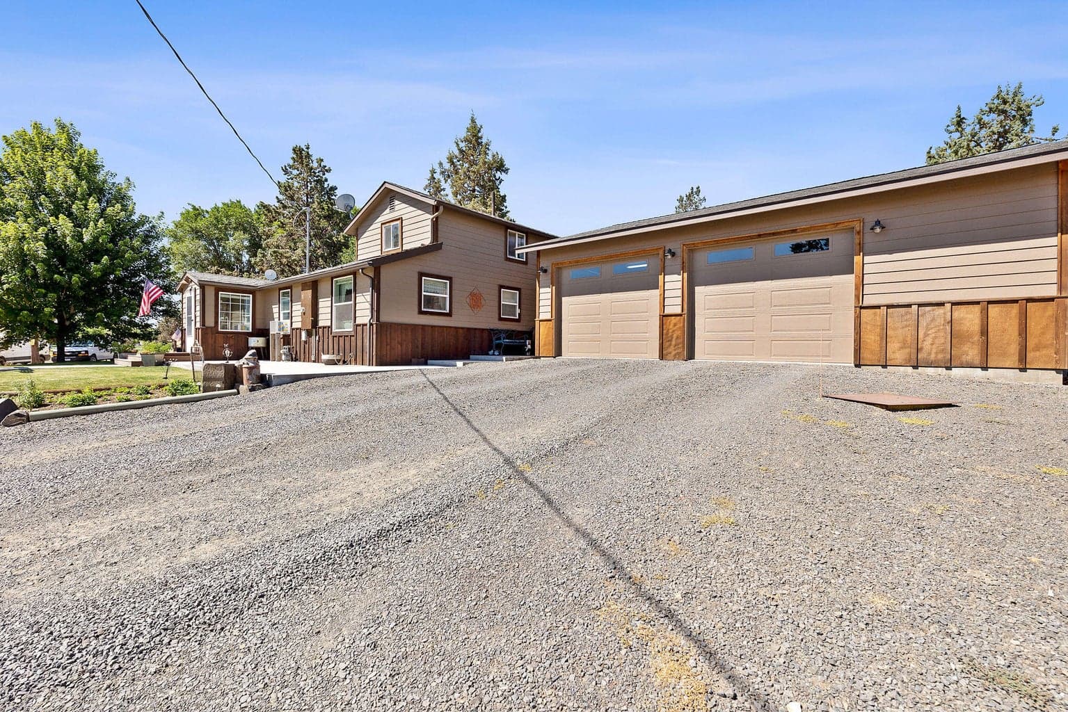 Exterior with Driveway and Garage