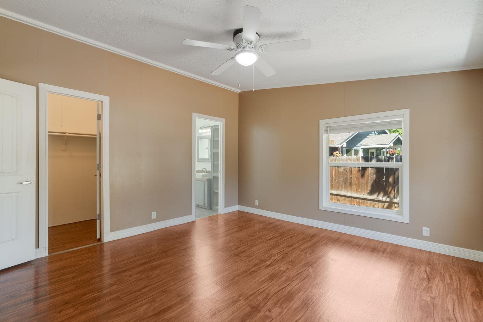 Primary bedroom with walk in closet.