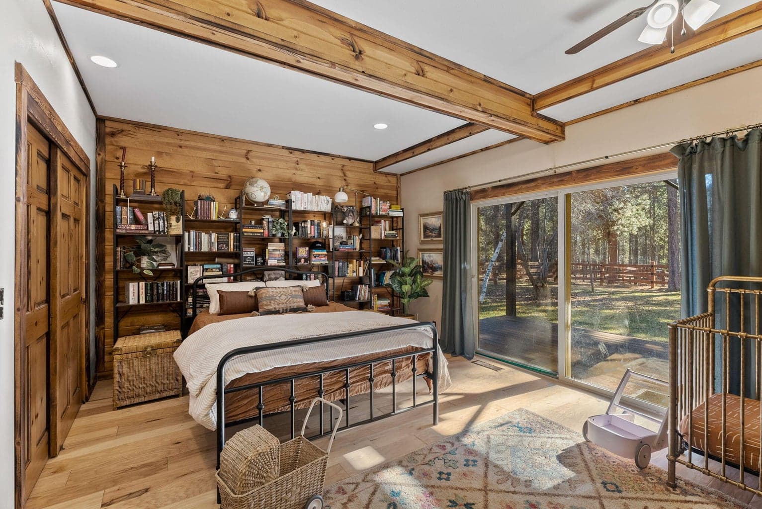 Lower level guest bedroom 1, sliding door to back yard.