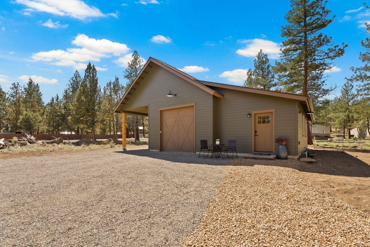 HUGE detached shop! 10 foot electric door, covered parking, 220V hook ups, and a flex space complete with full bath and kitchenette potential.