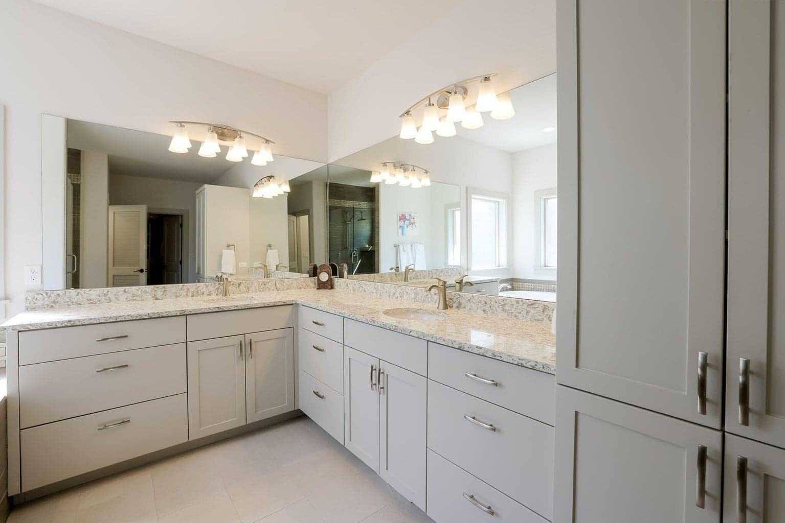 Solid Surface Counters, Dual Vanities, Tall Storage Cabinets