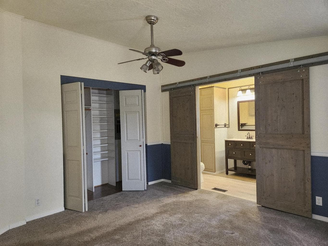 Large custom closet in primary suite.