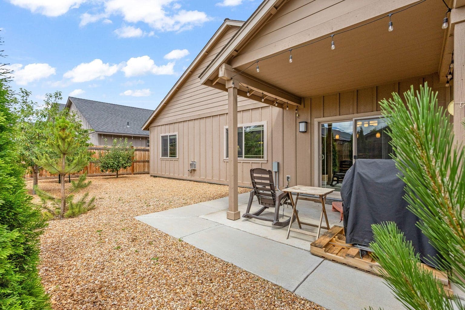 Xeriscaped backyard with covered patio