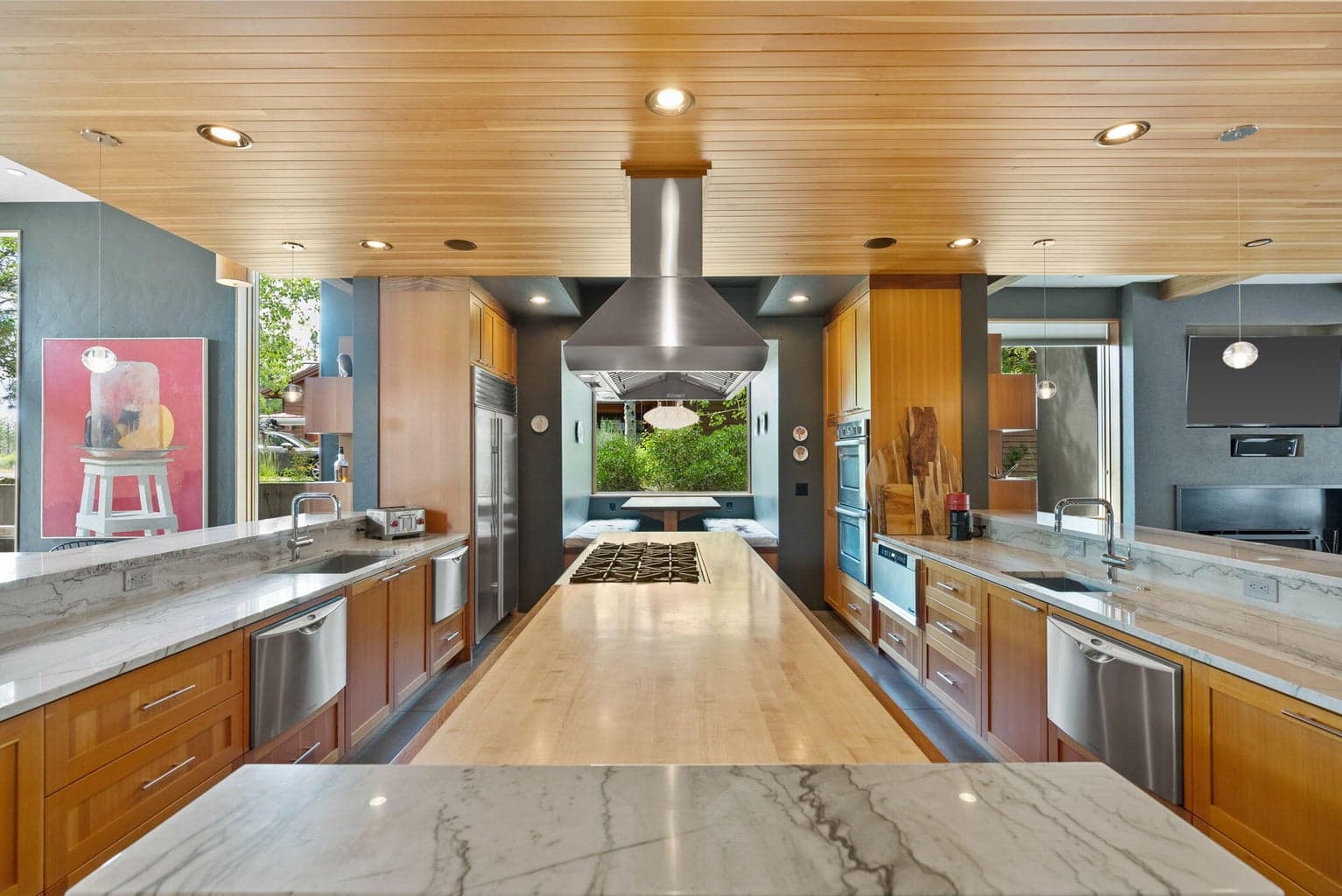 Subzero refrigerator, 3 Fisher Paykel dishwashers, 8 burner Wolf cooktop, Fisher Paykel double ovens and 2 sinks. A phenomenal space to enjoy, gather and entertain.