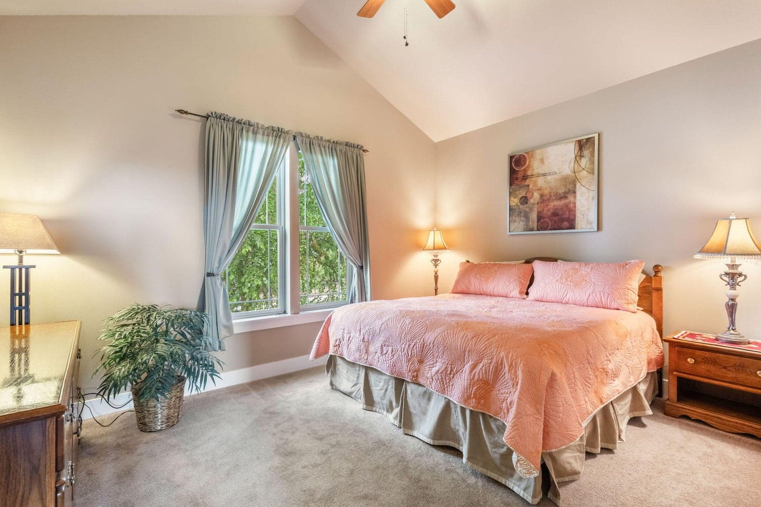 Bedroom 2, also vaulted and with ceiling fan.