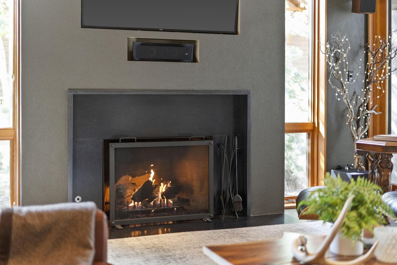 Fabulous gas fireplace and concrete surround.