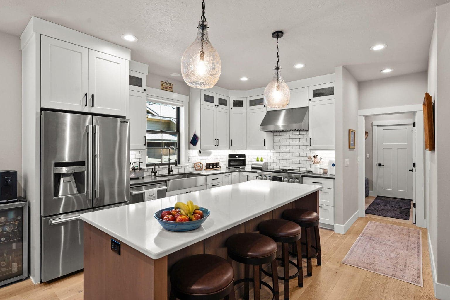 Full-height cabinets with undercabinet lighting